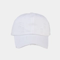 Detailed close-up of white distressed baseball cap with vintage frayed edges and torn cotton fabric - White