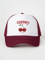 Detailed front view of two-tone cherry print trucker hat with breathable mesh back - One Size / White & Wine Red