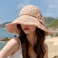 Beige wide brim straw hat with floral detail for sun protection on a beach - One Size / Ribbon with One Flower - Pink