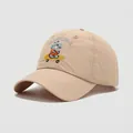 Close-up of beige kids baseball cap featuring breathable mesh and dinosaur embroidery - 54cm (3-8 Years Old) / Khaki