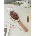 Detailed dimensions of wooden cushion hairbrush showing 25cm length and 7cm width size - Oval Cushion Brush