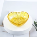 Heart-shaped resin trinket dish featuring golden foil flakes and yellow crystal stones - 11 Citrine + Gold Foil
