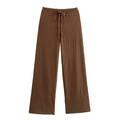 Detail of dark brown wide-leg trousers with textured crinkle fabric and elastic waistband - Dark Brown Pants