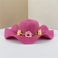 Rose red wide brim straw sun hat featuring wavy edges and decorative flowers - Rose Red