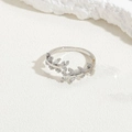Silver olive branch ring with zircon leaves and S925 engraving on a stone surface - Tree Branch Zircon / Platinum Color