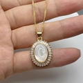 Detail view of gold Guadalupe necklace featuring a white shell Virgin Mary pendant with zircons - Style A-Oval Virgin Mary Mother of Pearl