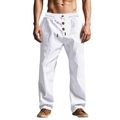 Detail of white linen pants featuring elastic drawstring waist and decorative buttons - White