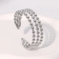 Bracelet jonc multicouche minimaliste en acier inoxydable argenté sur plateau blanc - Couleur Acier