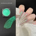 Aurora nail powder 02 creating a dreamy iridescent pearl effect with green shift - 02# Fairy Powder