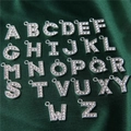 Detailansicht von 26 silbernen Buchstabenanhängern mit Strass auf Seide - Strass-Alphabet-Set (DY147) / 26er Set / Stil 53 Großer Weiß K