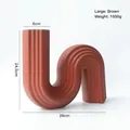 Modern large brown S-shaped ceramic vase with matte finish and minimalist wave design - S-Shaped Vase-Large / Brown