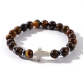 Detailed close-up of brown tiger eye bead bracelet with a white central cross pendant - Brown (Tiger Eye)