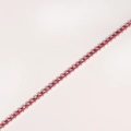 Macro view of silver claw-set tennis bracelet with continuous round pink zircons - Platinum Plated - Rose Red Zircon