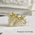 Set di quattro addobbi natalizi dorati a forma di cometa con glitter in confezione - Stella Cadente Dorata Set da 4
