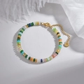 Bohemian style macaron colored bead bracelet with gold plated stainless steel clasp - Green