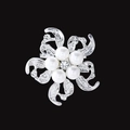 Silver flower brooch featuring white pearls and rhinestone center on black background - Silver Curved Hollow Floral Brooch (XD8824-2)