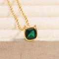 Macro shot of minimalist gold necklace featuring a square emerald-cut green gemstone pendant - Style 2 Gold (Square Shape)