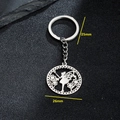 Silver metal fairy pendant keychain with 26mm diameter and 25mm ring on black background - 091-Hollow Fairy