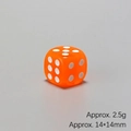 Close-up of a 14mm translucent orange resin dice with white dots weighing 2.5g - Orange