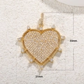 Detailed close-up of a 31x33mm gold plated heart pendant with sparkling cubic zirconia - A0045-Full Zirconia Paved Heart