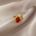 Detail of gold-plated ring with red oval gemstone and tiny leaf diamond settings - J0018-Ruby Red Oval Stone