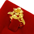 Elegant gold flower ring with leaf design on a red velvet display stand - Elegant Daisy Style (J2305)