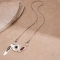 Silver metallic necklace with geometric disk pendants and red black gemstones - Silver