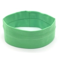 Detailed close-up showing the elastic reinforced inner seam of the green yoga headband - Seafoam Green