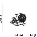 Detailed size view of a cartoon astronaut embroidery patch with dimensions of 6.8cm and 5.6cm - No. 12-Standing Astronaut