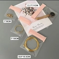 Pink frosted jewelry storage bags in four sizes with airtight seals on grey background - Set of 4 Sizes / Pink