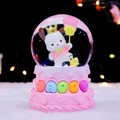 Pink musical crystal ball with cartoon puppy and yellow chick on a plush surface - 2409 Pink Base / Medium Size 80 With Snow Lights And Music