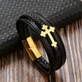 Detail view of handmade black braided leather bracelet with golden cross and magnetic clasp - Black With Gold Cross