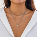Three-layer silver necklace set with rhinestones and multi-strand chains on a model - Silver-Rhinestone Ring Pendant