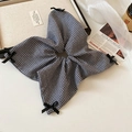 Detailed view of checkered scrunchie with black bows on a vintage aesthetic background - 5# Black & White Plaid Bow Style