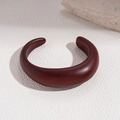 Close-up of a minimalist deep mahogany resin C-shaped open bangle on white texture - 2# Wide Smooth Open Style (Coffee)
