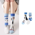 Asymmetrische blaue Baumwollsocken mit Pinguin-Motiv in mittellanger Ausführung - Gletscher Pinguin Stil (1065)