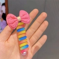 Rainbow spiral telephone wire hair tie with a pink bow decoration for kids - Pink Fabric Bow/Rainbow Spiral