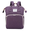 Front view of purple multi-functional diaper bag with wide handles and metal zippers - Purple