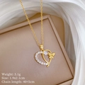 Macro detail of gold titanium heart and butterfly pendant with sparkling zircons - Gold Heart Butterfly Style (F537) / Gold