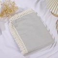 Macro detail of soft grey double-layer cotton gauze baby blanket with white tassel lace - Large Style / Light Gray