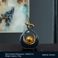 Modern ceramic flame sculpture in matte dark blue and gold finish for shelf decor - Blue Gold (Short)