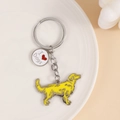 Dettaglio portachiavi in metallo con ciondolo Golden Retriever e scritta I Love Dogs - Golden Retriever + Cuore