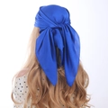 Close-up of royal blue satin square scarf with smooth texture and fine edge stitching - 70cm x 70cm / Blue