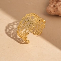 Detail of gold hollow pig nose chain cuff bracelet on warm sand texture background - Gold Anchor Link Hollow Style
