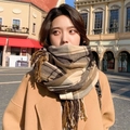 Soft khaki and brown plaid wool blend scarf with fringe tassels worn by a model - Khaki Plaid