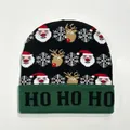 Detail of Christmas knit hat featuring Santa patterns and HO HO HO text on green cuff - Style 5 (Black Green Brim Santa HO HO HO)