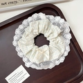 Green plaid scrunchie with white lace trim and ribbon bow on a wooden tray - Q530 Light Green Plaid White Lace