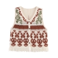 Dettaglio del gilet boho all'uncinetto con ricami floreali e frange decorative - S / Rosso