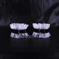 Black PU leather handcuffs with white lace trim and silver metal chain accessory - Leather/Lace/Metal / White Handcuffs