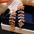 Detail of pink diamond tassel earrings on blue velvet showing 925 silver engraving - 11# Pink Wheat Ear Tassel Studs